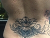 back tattoo black and gray flower