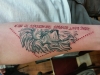 lion arm tattoo